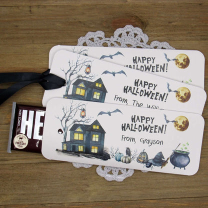 Spooky Personalized Halloween Candy Bar Favors, slide a candy bar in the open end, attach the ribbon for a sweet Halloween treat.  Printed on gray card stock these are very sturdy.  