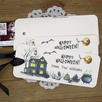 Spooky Personalized Halloween Candy Bar Favors, slide a candy bar in the open end, attach the ribbon for a sweet Halloween treat.  Printed on gray card stock these are very sturdy.  