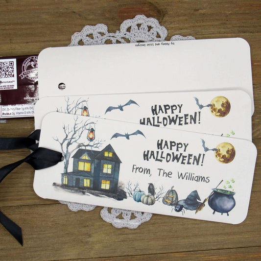 Spooky Personalized Halloween Candy Bar Favors, slide a candy bar in the open end, attach the ribbon for a sweet Halloween treat.  Printed on gray card stock these are very sturdy.  