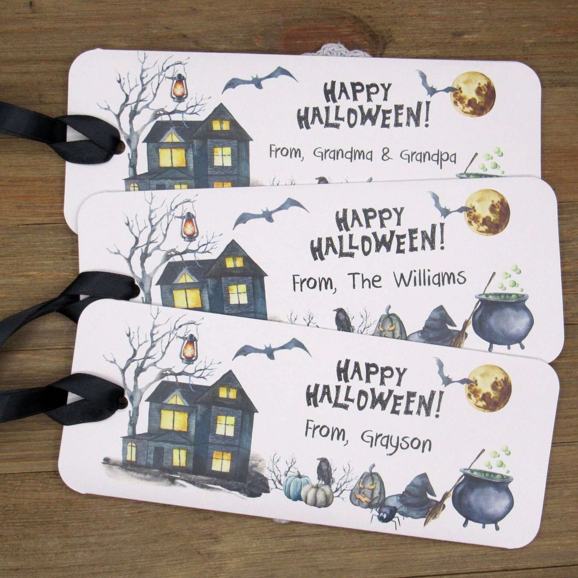 Spooky Personalized Halloween Candy Bar Favors, slide a candy bar in the open end, attach the ribbon for a sweet Halloween treat.  Printed on gray card stock these are very sturdy.  