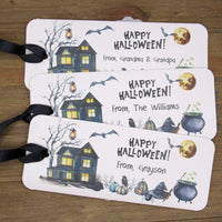 Halloween candy bar favors, personalized and spooky.  Slide a candy bar in the open end, attach the ribbon for a sweet Halloween treat.  Printed on gray card stock these are very sturdy.  
