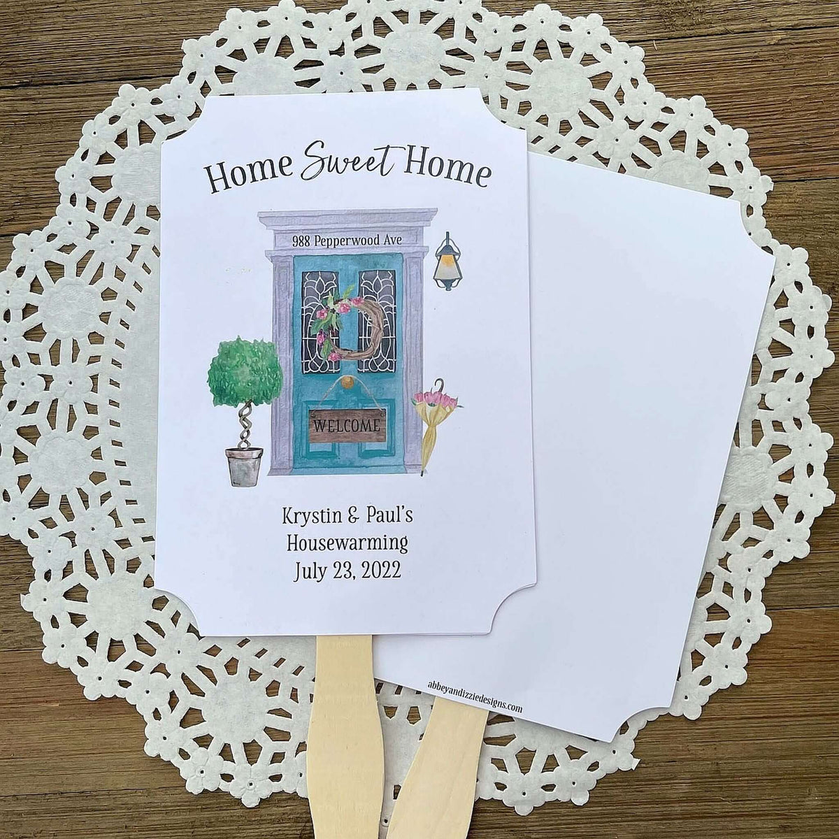 Our personalized housewarming favor fans are perfect for that summer party.  Printed on white cardstock and adorned with a beautiful front door these are sure to be a hit.  A great keepsake for guests to take home.