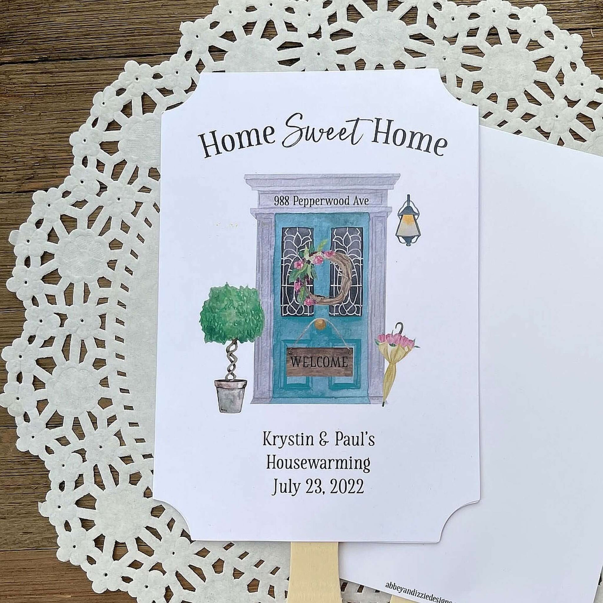 Our personalized housewarming favor fans are perfect for that summer party.  Printed on white cardstock and adorned with a beautiful front door these are sure to be a hit.  A great keepsake for guests to take home.
