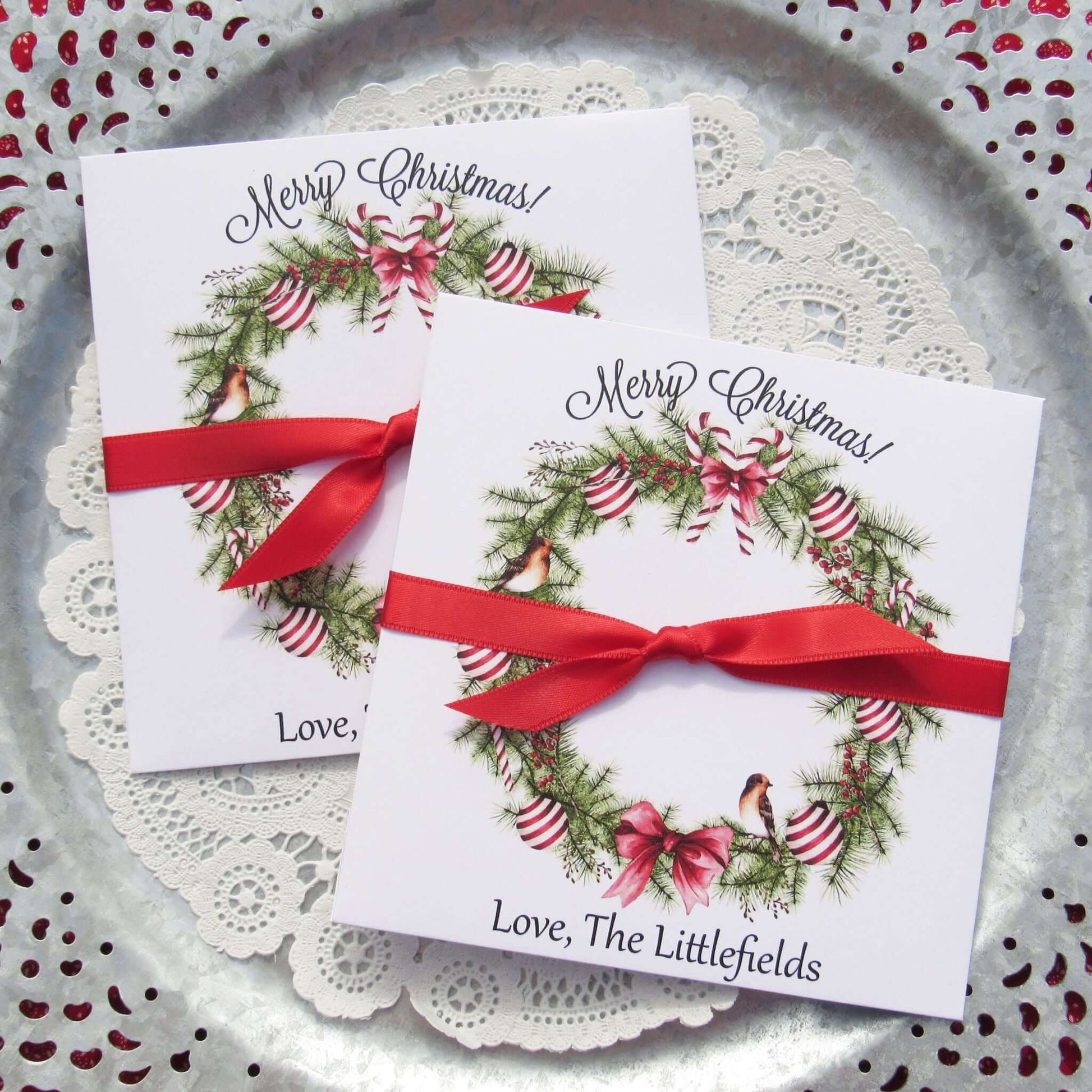 Christmas Gift Card Holders or Holiday Party Favors, adorned with a beautiful holiday wreath these are also perfect to slide a lottery ticket in for a coworker, neighbor or friend.  