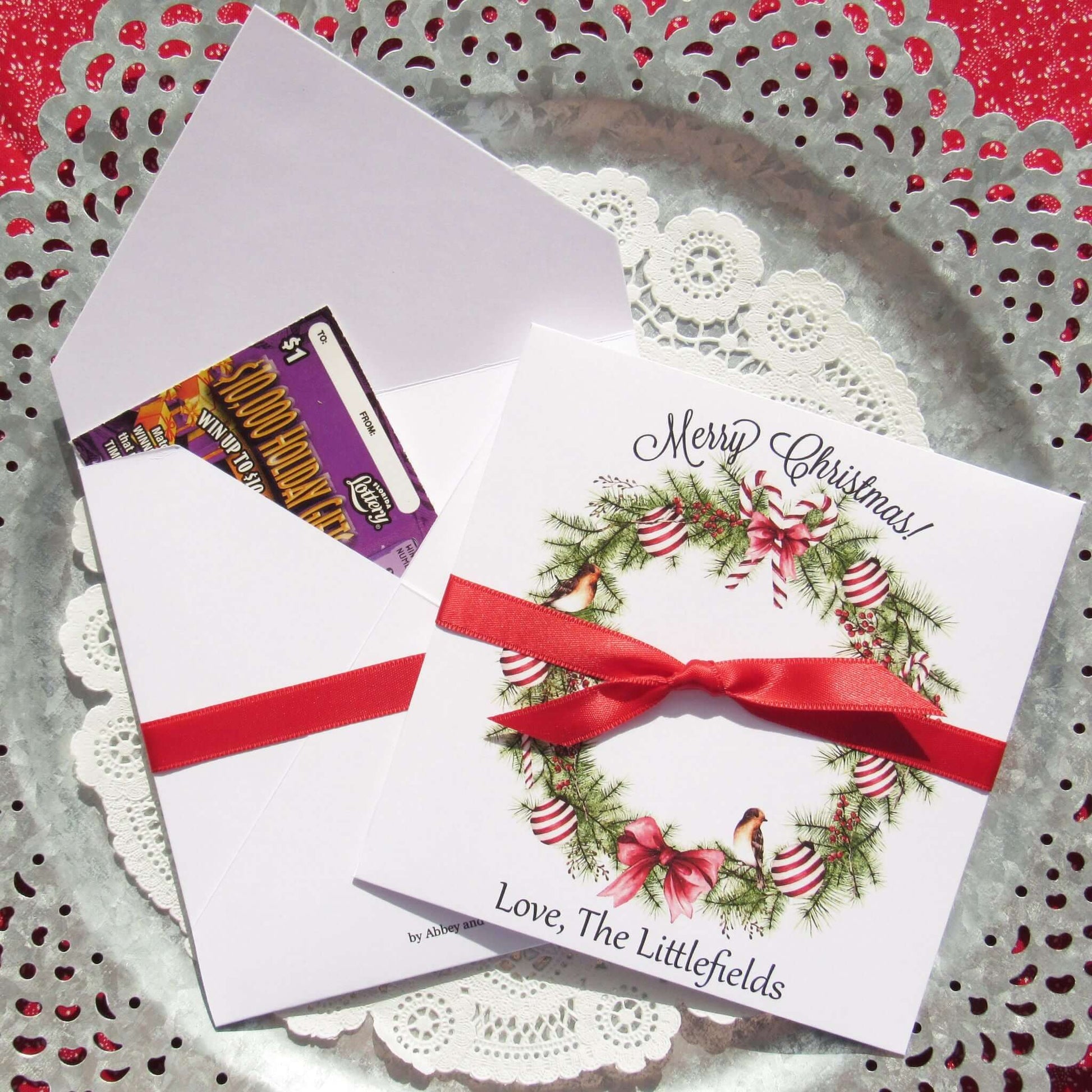 Christmas Gift Card Holders or Holiday Party Favors, adorned with a beautiful holiday wreath these are also perfect to slide a lottery ticket in for a coworker, neighbor or friend.  