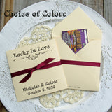 Rustic Wedding Guest Favors, printed with 'Lucky In Love' and the bride and groom with wedding date.  Large envelopes, easy to add a scratch off lotto ticket for a fun favor.  Your choice of envelope and ribbon color.