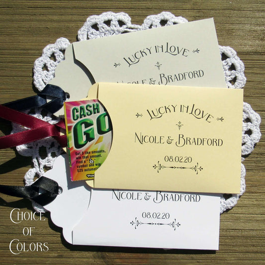 Lucky In Love Wedding Lotto Favors, personalized for the bride and groom.  Slide a lottery ticket these adorable envelopes for a fun wedding favor.