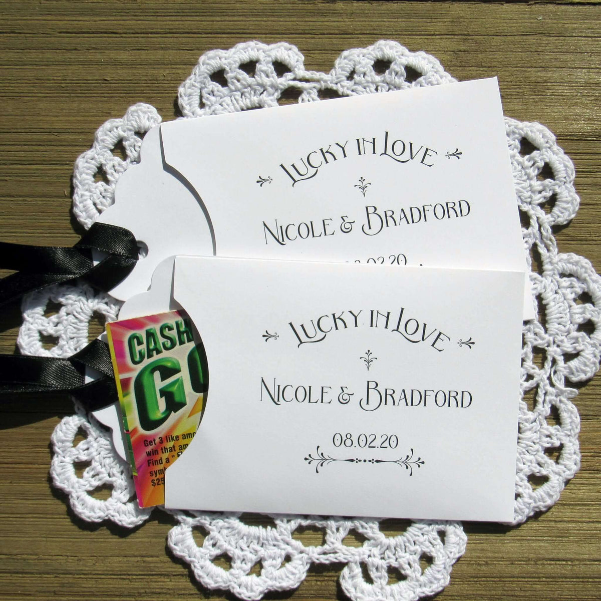 Lucky In Love Wedding Lotto Favors, personalized for the bride and groom.  Slide a lottery ticket these adorable envelopes for a fun wedding favor.
