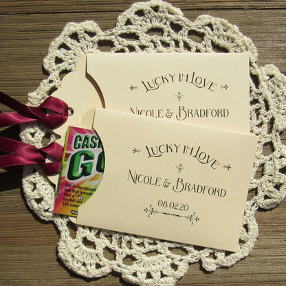 Lucky In Love Wedding Lotto Favors, personalized for the bride and groom.  Slide a lottery ticket these adorable envelopes for a fun wedding favor.
