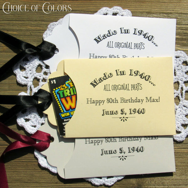 Fun adult birthday party favors, slide lottery ticket in the envelope and which guest wins.  Envelopes are personalized for the guest of honor with made in year, name and birth date.  Your choice of envelope and ribbon color. 
