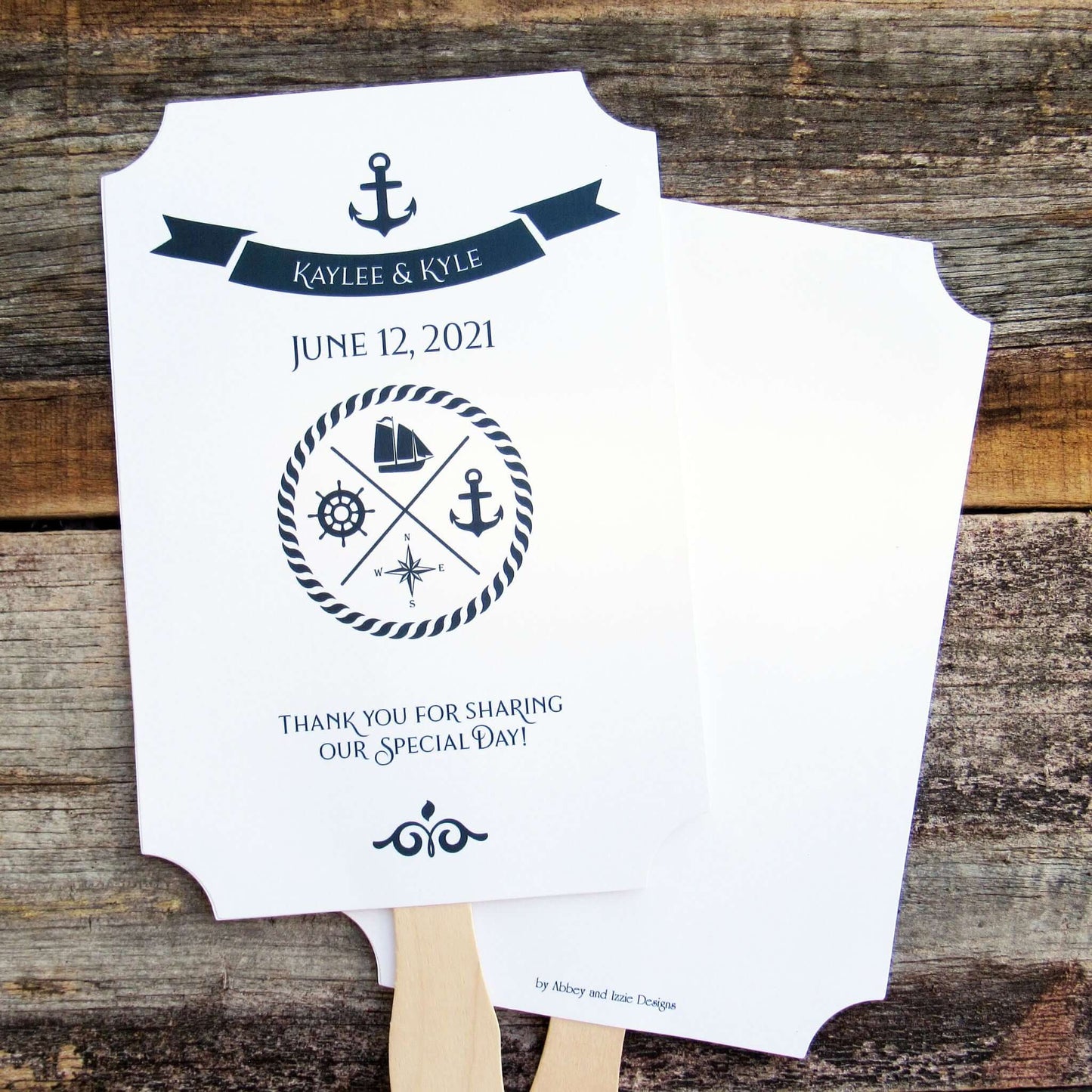 Personalized Nautical Theme Wedding Fans  printed on white card stock with navy text.  Hand fans are personalized for the bride and groom, fans ship assembled and ready to use.  Two sided with handle hidden between for a more finished look.  