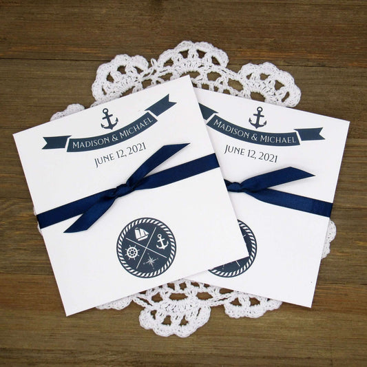 Personalized Nautical Wedding Favors, white card stock envelopes printed with the bride and grooms name and wedding date.  Your choice of ribbon color which comes attached.  Perfect for your nautical theme wedding.