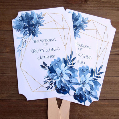 Blue Wedding Fans Assembled with a geometric design gives these fans a modern flare.  Printed on white card stock with blue flowers and personalized for the bride and groom.  Two sided with handle hidden between, printing on one side only.  Fans ship assembled and ready for your special day.