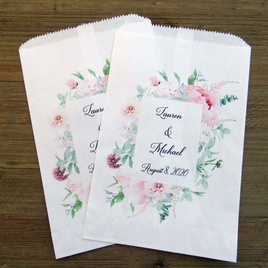 Pink Floral Wedding Favor Bags Personalized for the bride and groom.  White bags printed with a pink floral frame, bags are larger than most and can be used for a candy buffet, cookie bags or popcorn bags. 