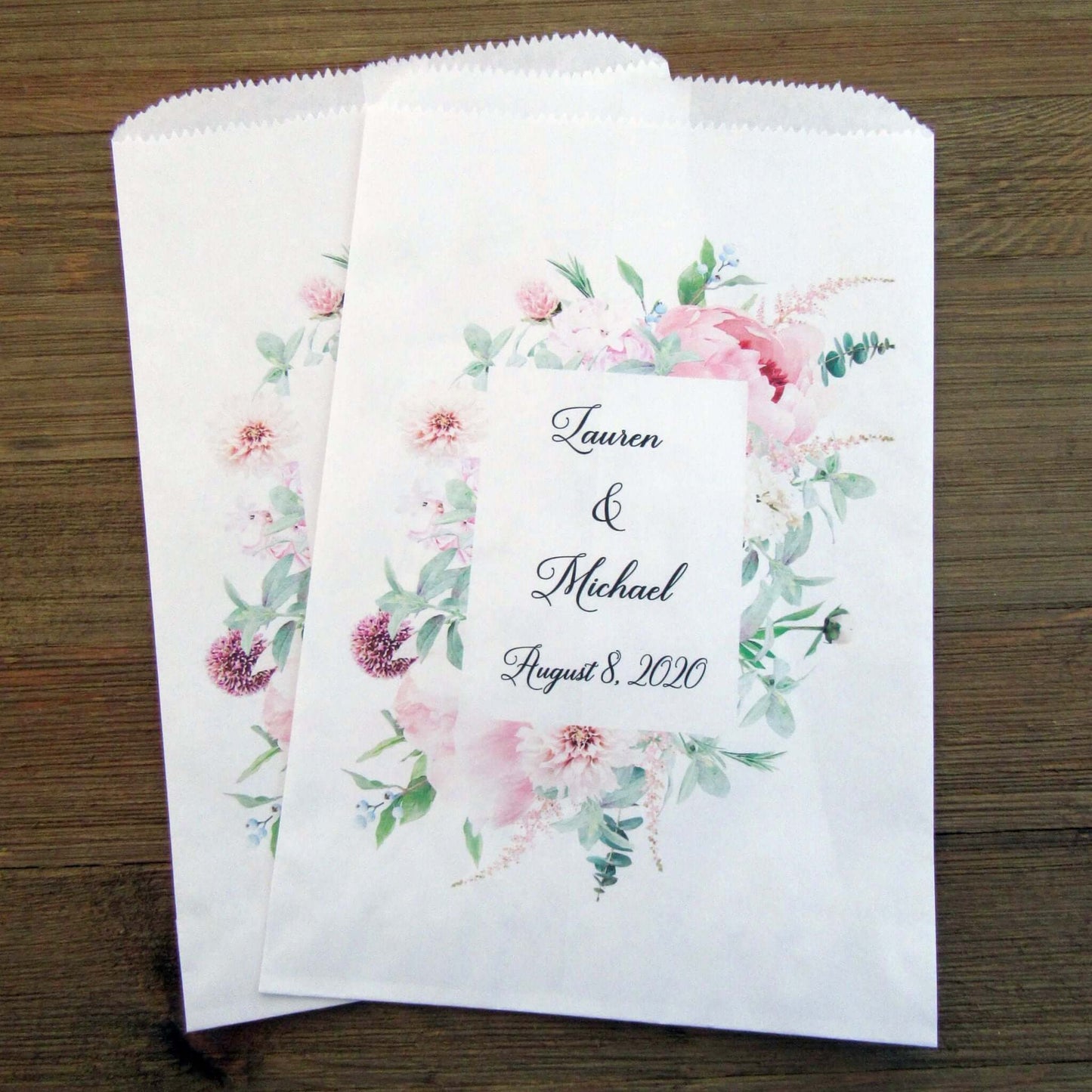 Pink Floral Wedding Favor Bags Personalized for the bride and groom.  White bags printed with a pink floral frame, bags are larger than most and can be used for a candy buffet, cookie bags or popcorn bags. 
