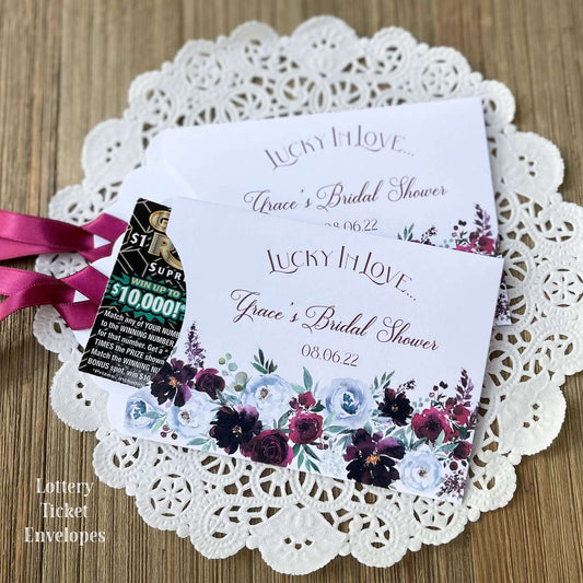 Lucky in love bridal shower favors, Burgundy Bridal Shower Favors Personalized  white envelopes adorned with burgundy flowers and personalized for the bride to be.  Burgundy ribbon comes attached, slide a lotto ticket in for a fun bridal shower favor.