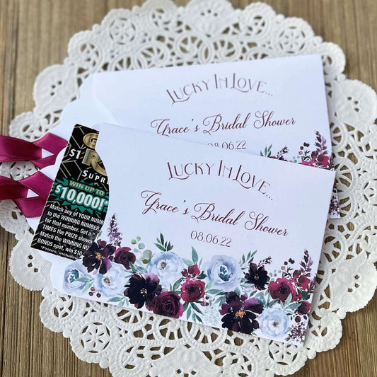 Lucky in love bridal shower favors, Burgundy Bridal Shower Favors Personalized  white envelopes adorned with burgundy flowers and personalized for the bride to be.  Burgundy ribbon comes attached, slide a lotto ticket in for a fun bridal shower favor.