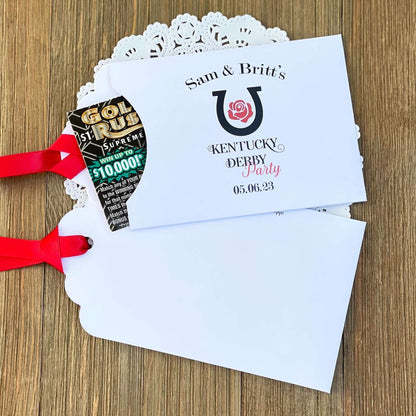 Personalized Kentucky Derby Party Favors , white envelopes adorned with Kentucky Derby Party red ribbon comes attached.  Slide a lottery ticket in and see who wins.
