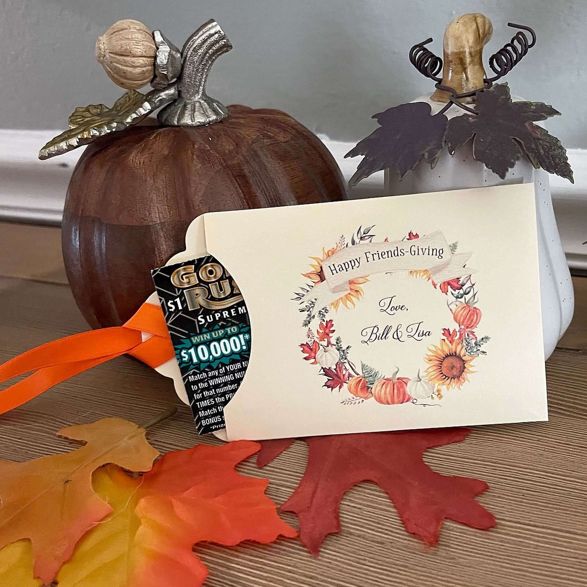 Personalized Friendsgiving Table Favors to add that special touch to your table.  Printed on ivory card stock with a fall wreath printed to bring the colors to your table.  Slide a lottery ticket in to see which guest wins, adding some fun to your Friendsgiving celebration.
