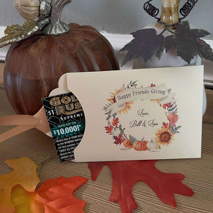 Personalized Friendsgiving Table Favors to add that special touch to your table.  Printed on ivory card stock with a fall wreath printed to bring the colors to your table.  Slide a lottery ticket in to see which guest wins, adding some fun to your Friendsgiving celebration.
