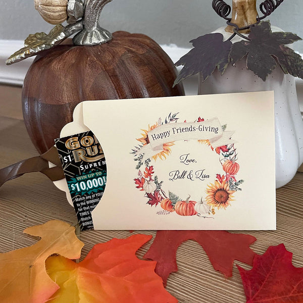 Friendsgiving Favors that are personalized to add that special touch to your table.  Printed on ivory card stock with a fall wreath printed to bring the colors to your table.  Slide a lottery ticket in to see which guest wins, adding some fun to your Friendsgiving celebration.