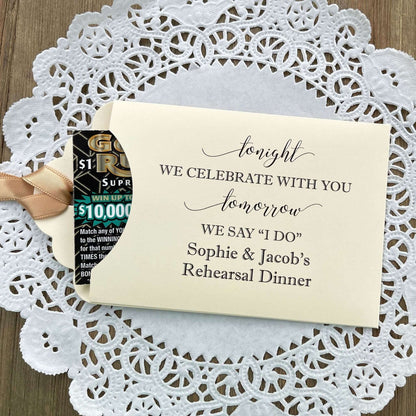 Fun rehearsal dinner favors, slide a lottery ticket in each one and see which guest wins.  Personalized favors for the bride and groom with choice of envelope and ribbon color.