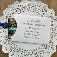 Fun rehearsal dinner favors, slide a lottery ticket in each one and see which guest wins.  Personalized favors for the bride and groom with choice of envelope and ribbon color.
