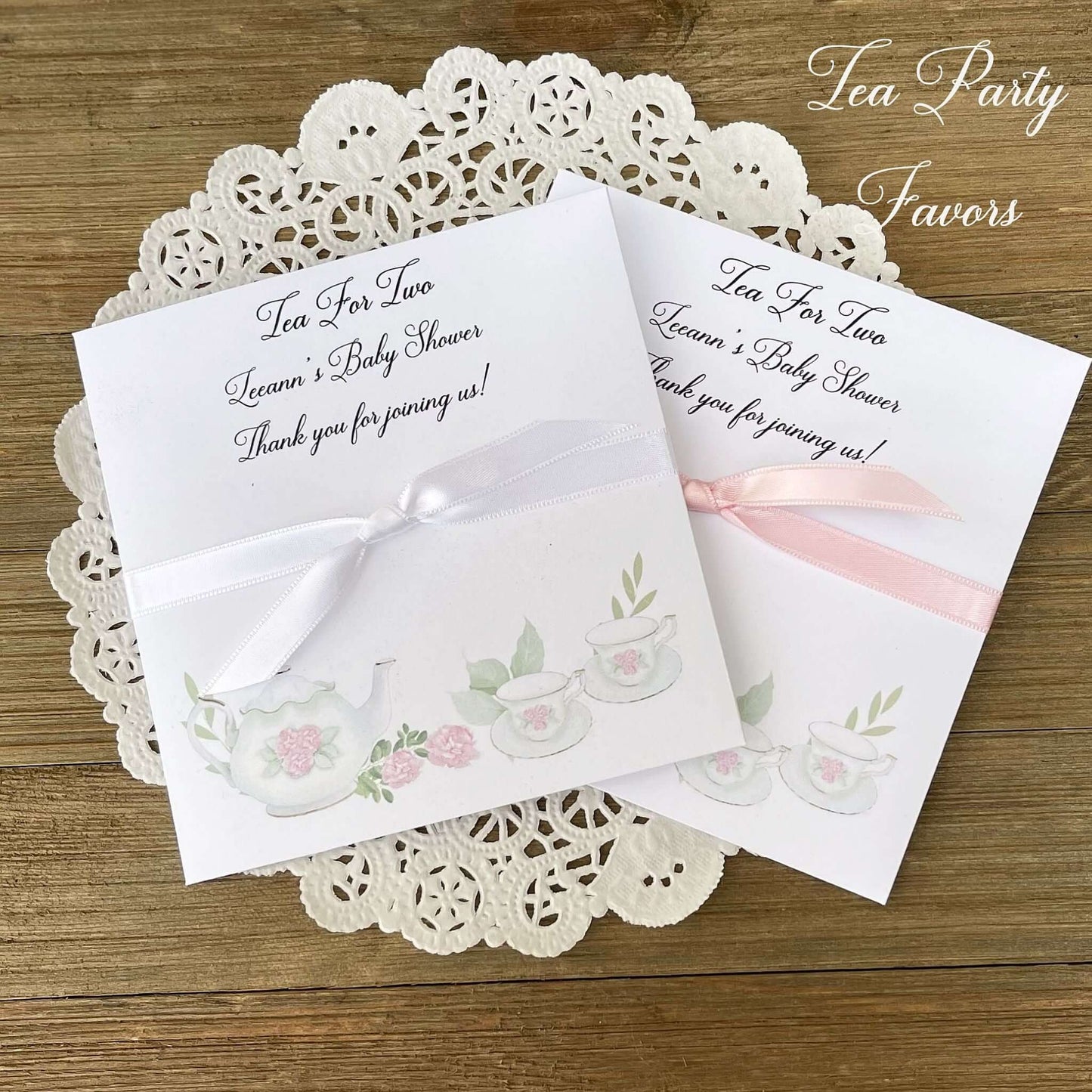 Tea Party Baby Shower Favors add your favorite tea bags to these envelopes for a sweet baby shower favor.  Tea for two, perfect for a twin baby shower.  Adonred with tea pot and cups in pink and white. 