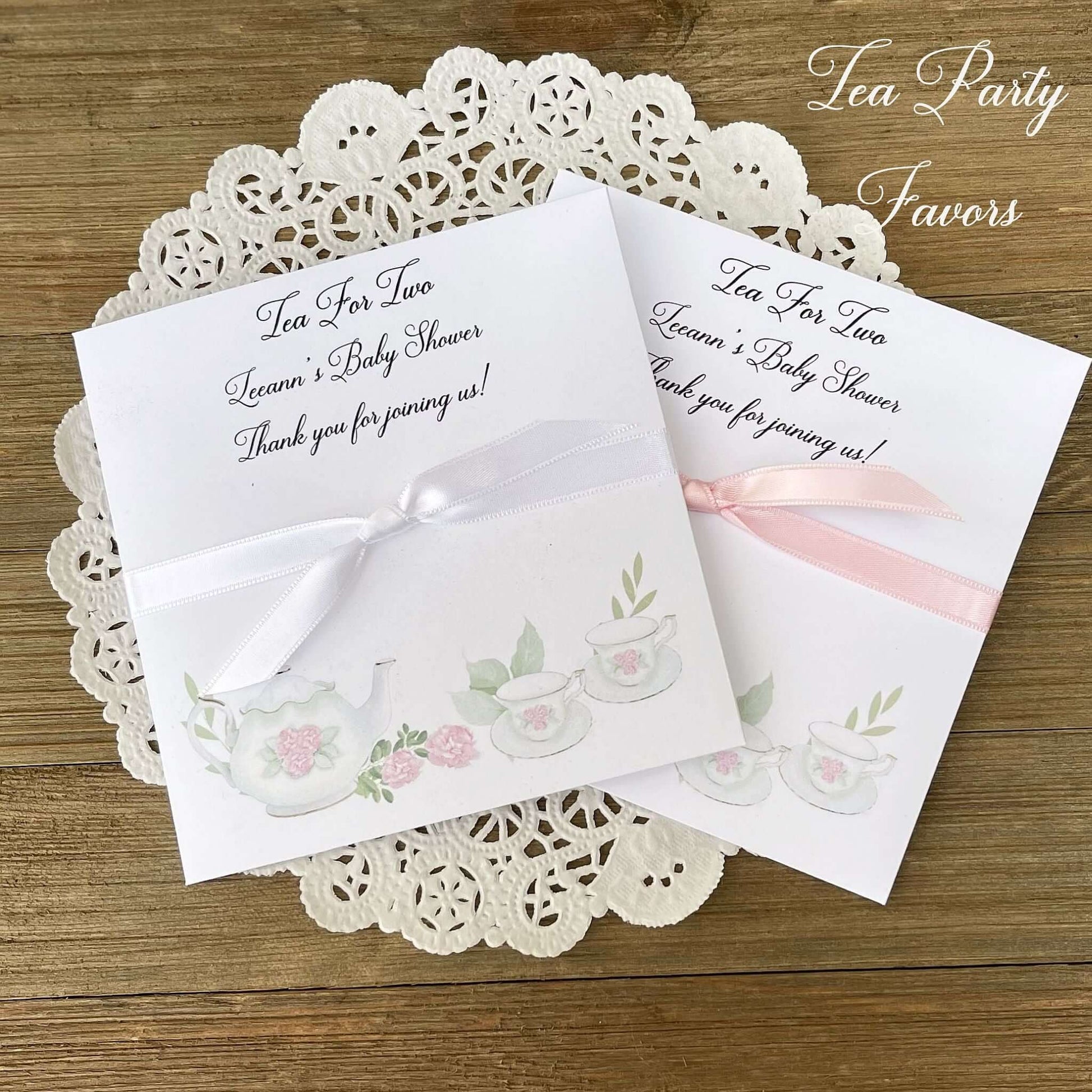 Tea Party Baby Shower Favors add your favorite tea bags to these envelopes for a sweet baby shower favor.  Tea for two, perfect for a twin baby shower.  Adonred with tea pot and cups in pink and white. 