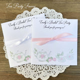 Bridal shower tea party favors, personalized for the bride to be.  Slide tea bags in the envelope for the perfect tea party table favor.  Adorned with teapot and teacups your choice of pink or white ribbon.
