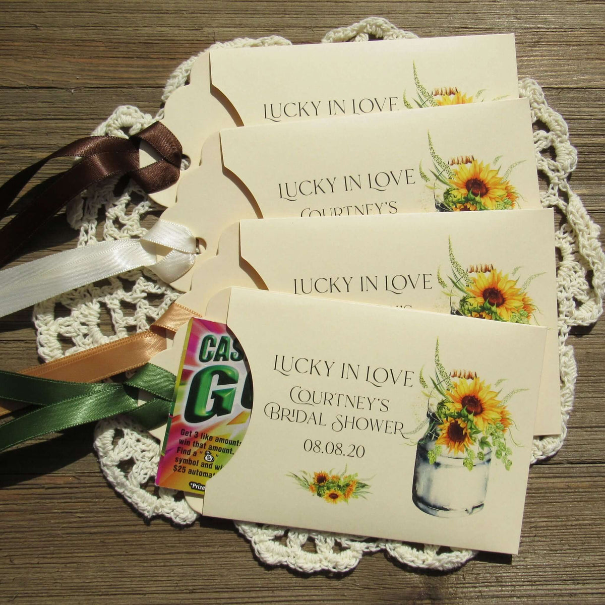 Sunflower Bridal Shower Favors personalized for the guest of honor.    Lotto ticket envelopes for bridal shower favors adorned with sunflowers.  