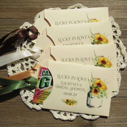 Sunflower Bridal Shower Favors personalized for the guest of honor.    Lotto ticket envelopes for bridal shower favors adorned with sunflowers.  