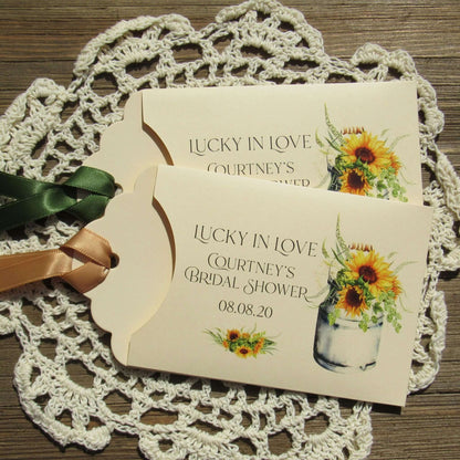 Sunflower Bridal Shower Favors personalized for the guest of honor.    Lotto ticket envelopes for bridal shower favors adorned with sunflowers.  