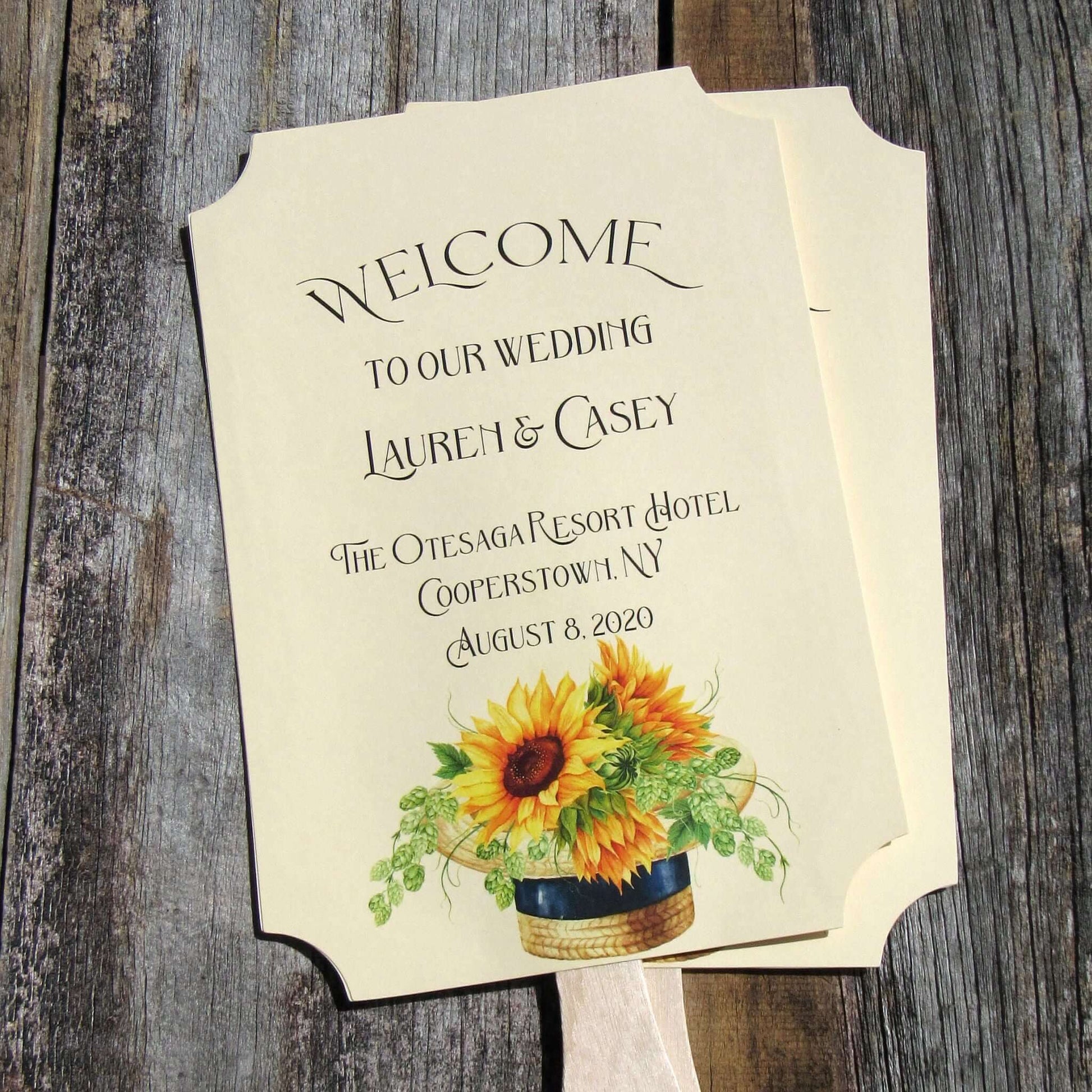 Sunflower Wedding Favor Fans are personalized for the bride and groom including place and date.  Printed on ivory card stock fans are two sided with handle hidden between, they ship to you fully assembled.