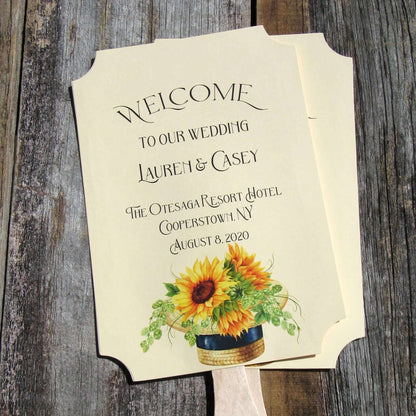 Sunflower Wedding Favor Fans are personalized for the bride and groom including place and date.  Printed on ivory card stock fans are two sided with handle hidden between, they ship to you fully assembled.