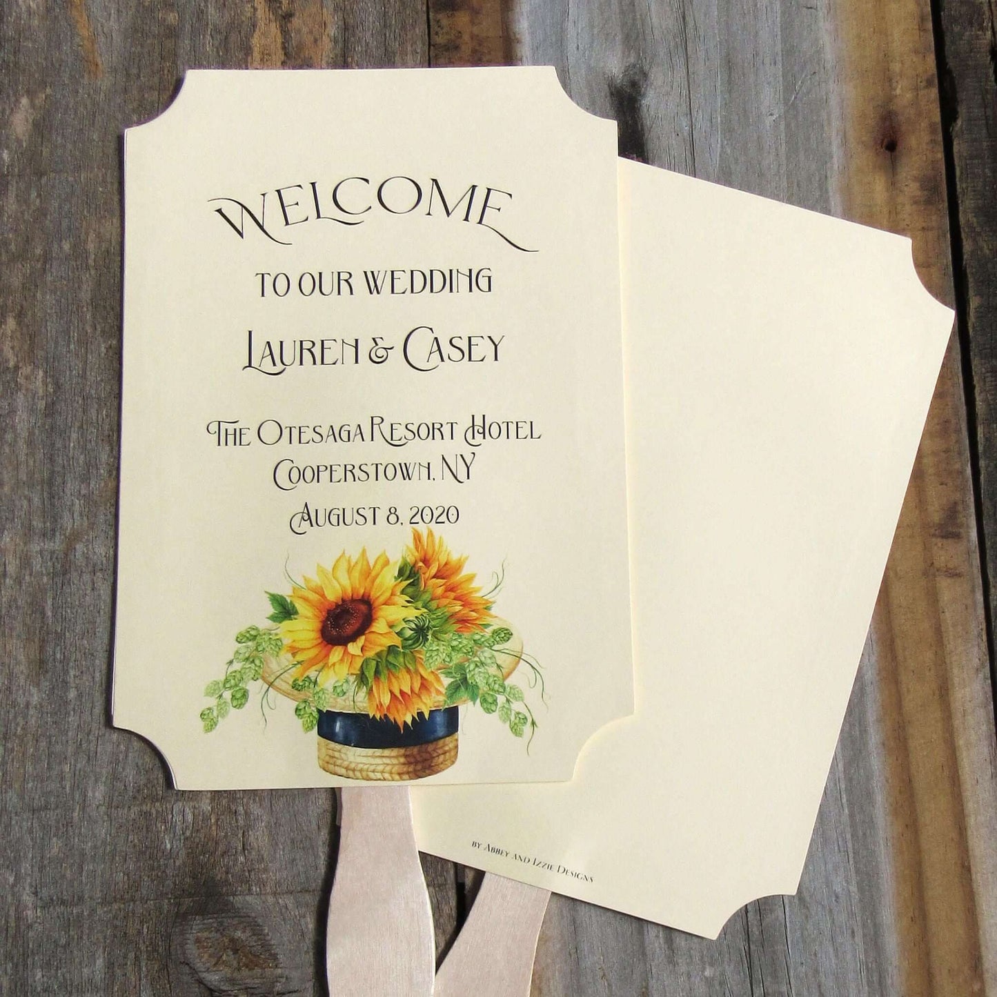 Sunflower Wedding Favor Fans are personalized for the bride and groom including place and date.  Printed on ivory card stock fans are two sided with handle hidden between, they ship to you fully assembled.