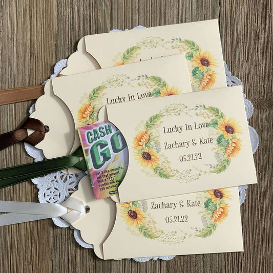Sunflower Wedding Favors Lotto Ticket Holders, personalized for the bride and groom.  Envelopes are ivory with your choice of ribbon color, adorned with a beautiful sunflower frame.  