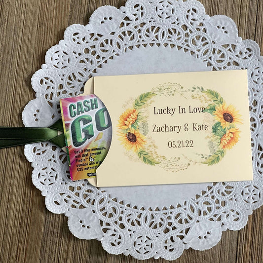 Sunflower Wedding Favors Lotto Ticket Holders, personalized for the bride and groom.  Envelopes are ivory with your choice of ribbon color, adorned with a beautiful sunflower frame.  
