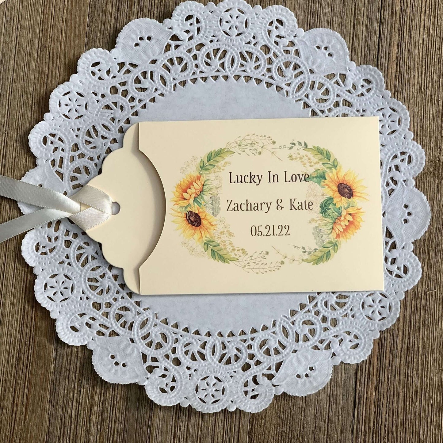 Sunflower Wedding Favors Lotto Ticket Holders, personalized for the bride and groom.  Envelopes are ivory with your choice of ribbon color, adorned with a beautiful sunflower frame.  