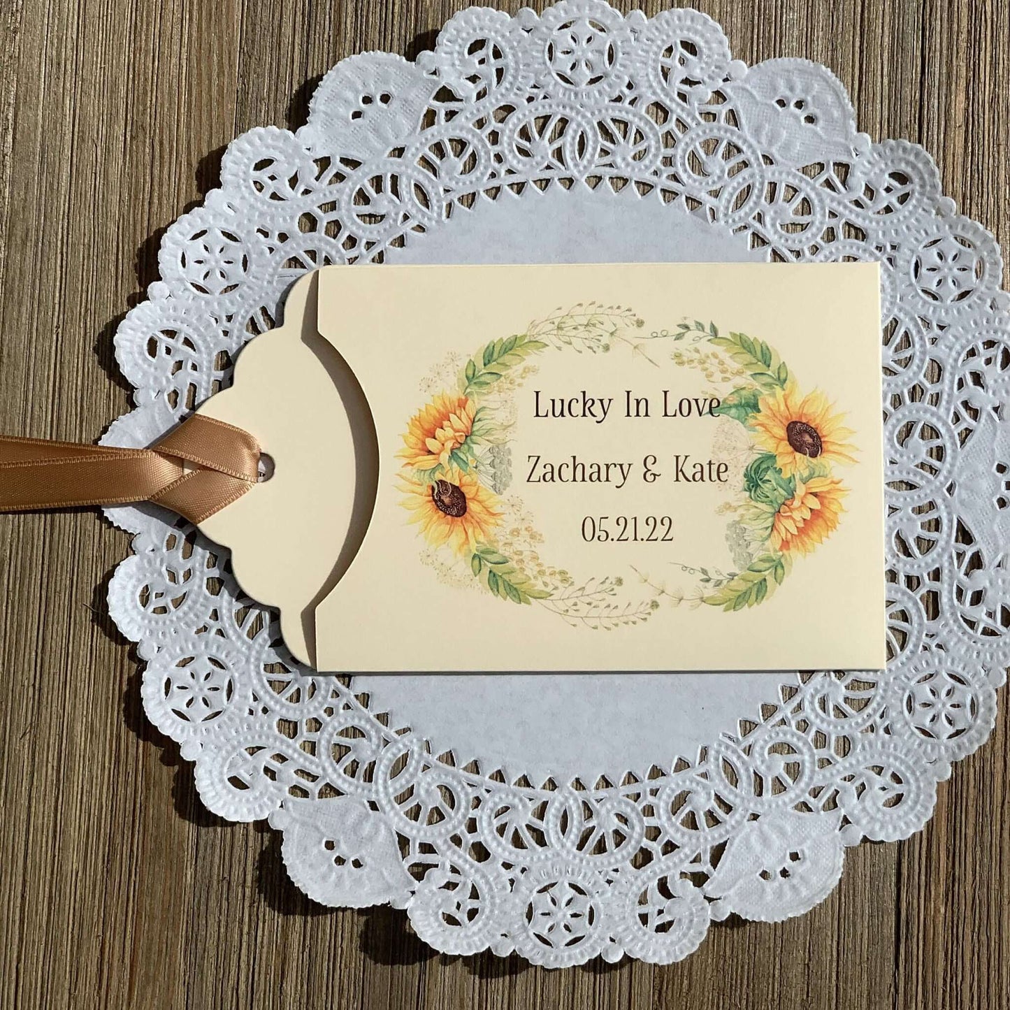 Sunflower Wedding Favors Lotto Ticket Holders, personalized for the bride and groom.  Envelopes are ivory with your choice of ribbon color, adorned with a beautiful sunflower frame.  