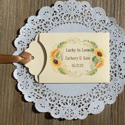 Sunflower Wedding Favors Lotto Ticket Holders, personalized for the bride and groom.  Envelopes are ivory with your choice of ribbon color, adorned with a beautiful sunflower frame.  