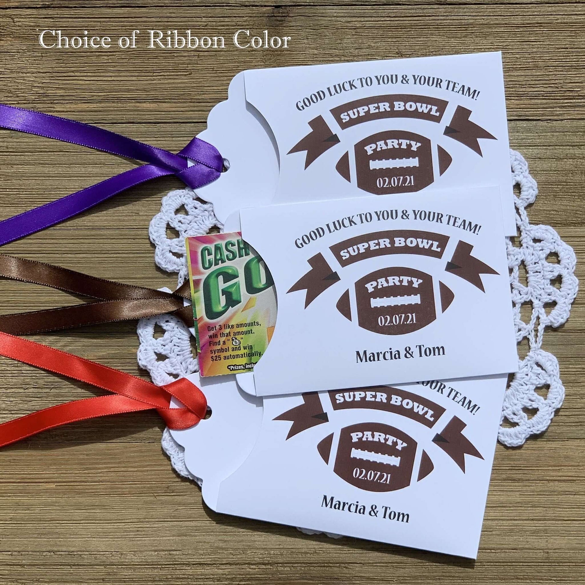 Super Bowl Party Favors - Football Party Favors, printed on white card stock with your choice of ribbon color.  Personalized for you, adorned with a football and the party date.  Slide a scratch off lottery ticket in the open end, a fun party favor.