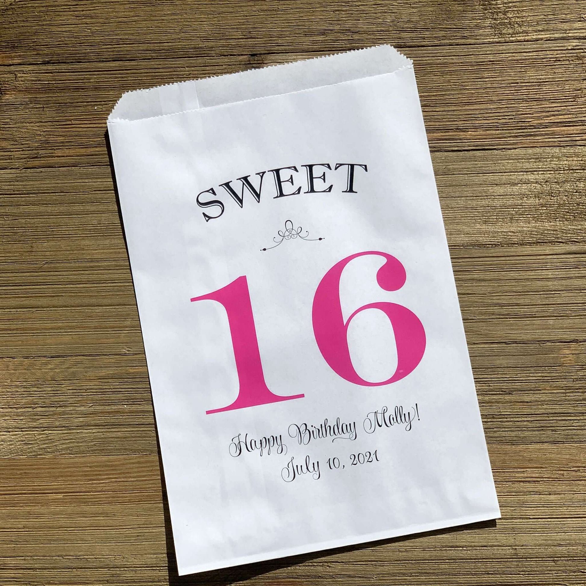 Personalized Sweet 16 Favor Bags for the guest of honor.  White bags printed with sweet 16 in large print with color options.  Can be used for candy bags, cookie bags or treat bags.  