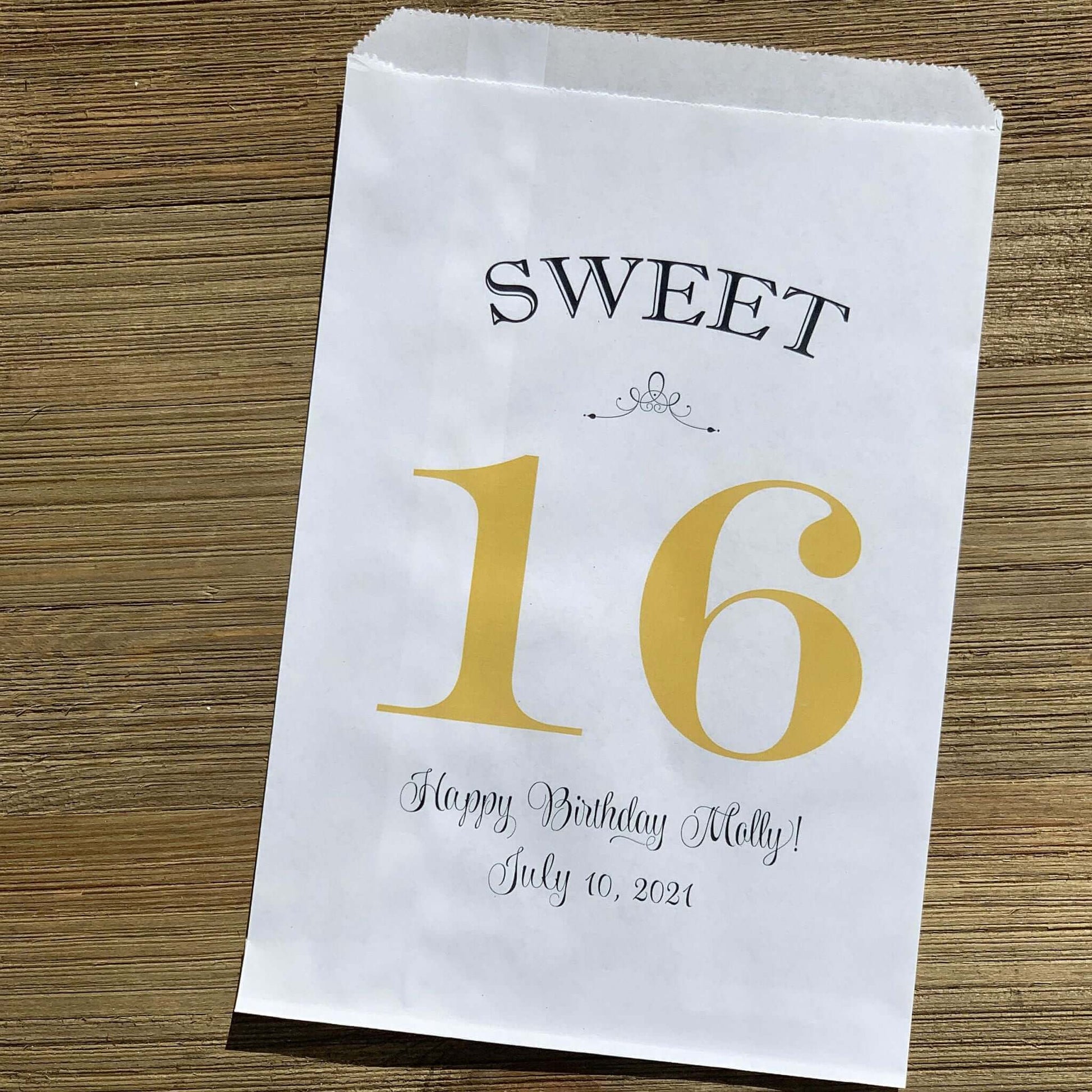 Personalized Sweet 16 Favor Bags for the guest of honor.  White bags printed with sweet 16 in large print with color options.  Can be used for candy bags, cookie bags or treat bags.  
