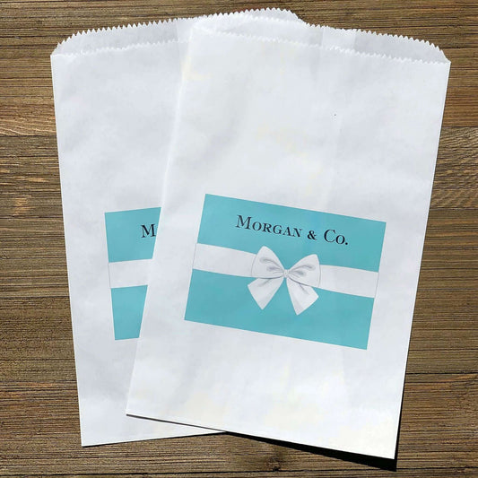 Personallized Aqua Blue Favor Bags with your name & Co.  Printed with a tiffany color package with a white bow, these are perfect for a candy buffet, cookies or even popcorn bags. 