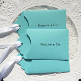Tiffany Blue Wedding Favors personalized for the bride and groom.  Slide a lottery ticket in to see who wins big at your wedding.  Tiffany  blue wedding favors adorned with a white ribbon which comes attached.