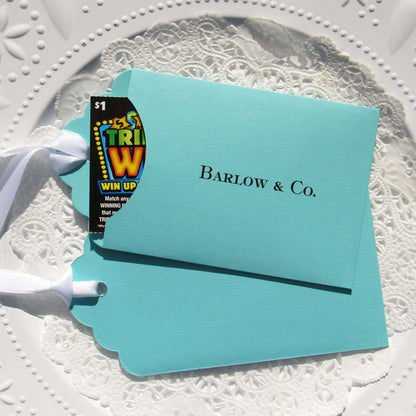 Aqua Blue Wedding Guest Favors personalized for the bride and groom.  Slide a lottery ticket in to see who wins big at your wedding.  Tiffany  blue wedding favors adorned with a white ribbon which comes attached.