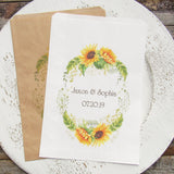 Sunflower Favor Bags that are personalized for the bride and groom.  Adorned with a sunflower wreath around the names and wedding date.  Your choice of white or brown bags. 