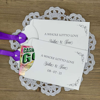 A Whole Lotto Love Wedding Guest Favors, personalized for the bride and groom.  Slide a lotto ticket in for a fun wedding favors, see which guest wins big.