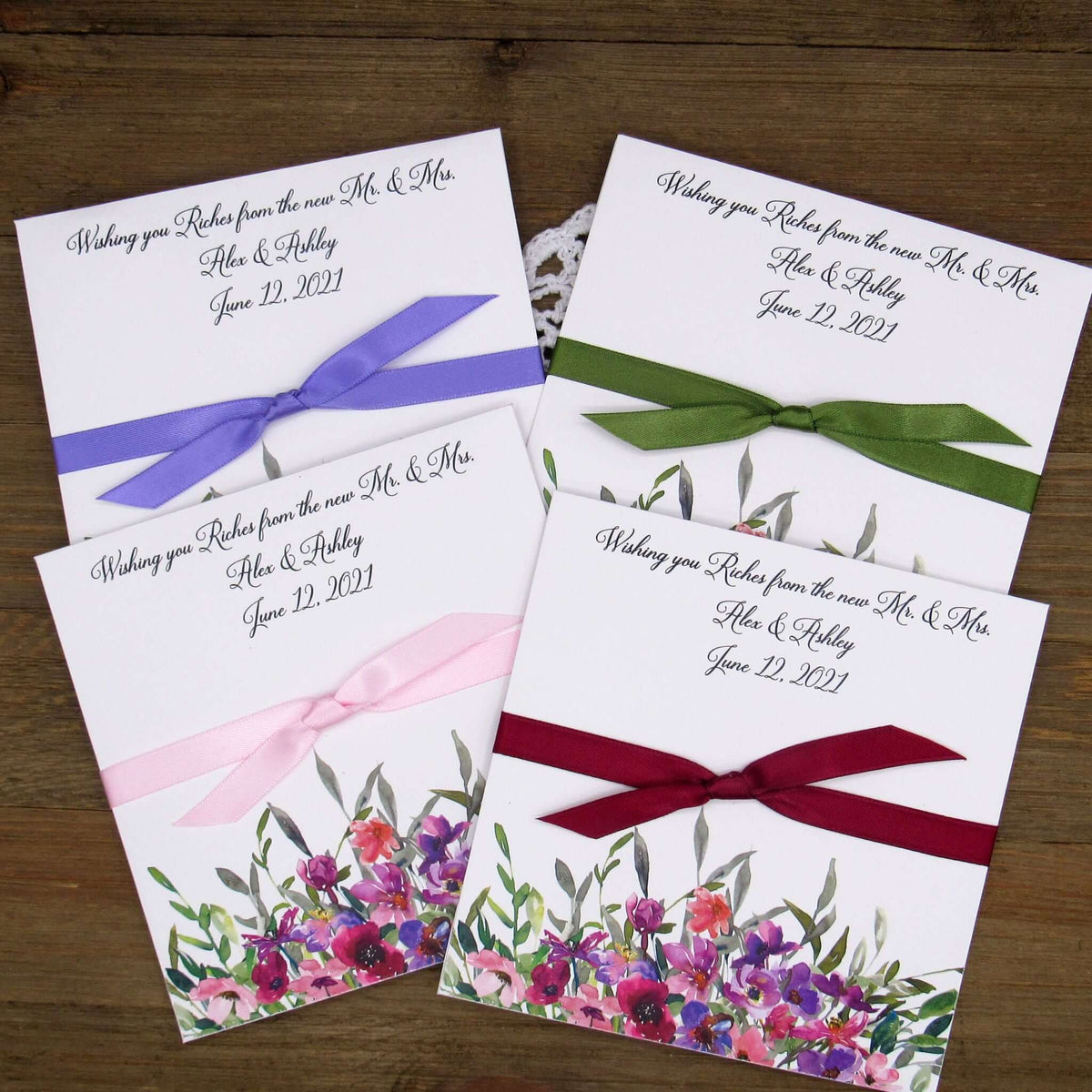 Purple Floral Wedding Guest Favors printed on white card stock with ribbon tied.  Personalized lottery ticket envelope favors, insert an instant lotto ticket for a fun guest favor.